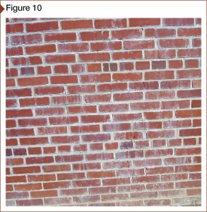 Lime scum on old brick laid with restoration mortar that had a high lime content, which had reacted with aggressive, improper chemical cleaning (i.e. it was not properly pre-wetted and rinsed). Photo courtesy Joseph Crissinger