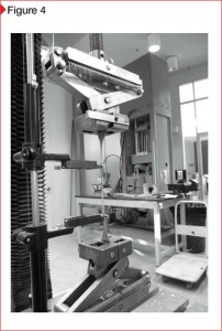 Elongation testing using a universal test machine.