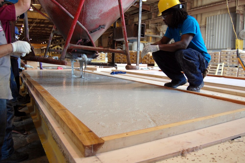 Casting a UHPC panel at the precast plant.