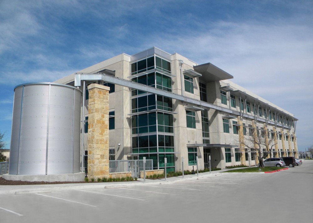 In Austin, Texas, Dalchau Service Center Building D (STG Design) melds tilt-up concrete with various metal and glass components to achieve visual balance. Construction work was performed by American Constructors Inc.