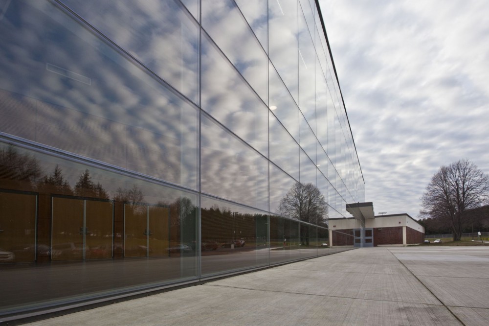 Framing anchors glazing and determines allowable free spans.