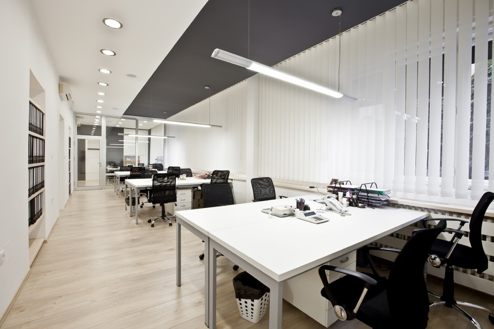 Over the last decade, many methods of controlling acoustics have been systematically eliminated. The percentage of open-plan spaces has increased, partitions have lowered or disappeared, absorptive finishes have been replaced by hard surfaces, and floor plates have narrowed. [CREDIT] Photo © iStockphoto/Goran Bogicevic. 