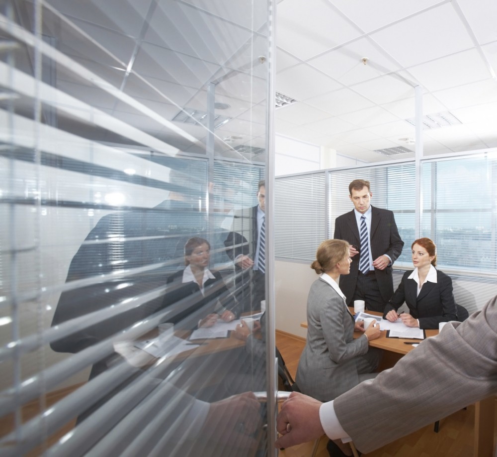 Sound masking continues to provide acoustic control when a meeting room’s door is open and the isolation it provided virtually disappears. [CREDIT] Photo © iStockphoto/mediaphotos 