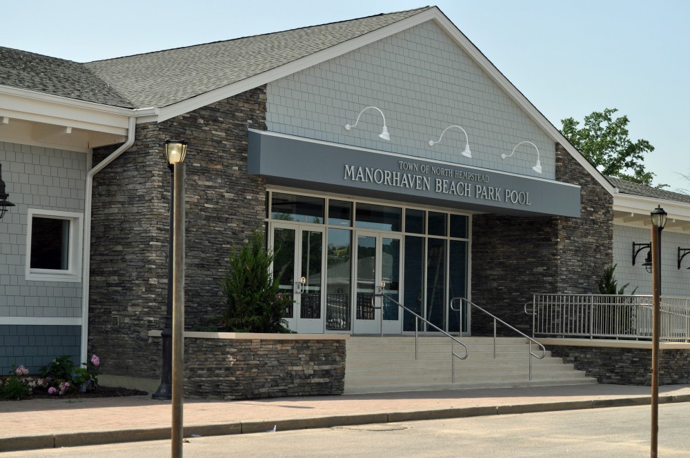 Fiber cement siding enables buildings to stand up better in both everyday and extreme weather. This photo shows fiber cement siding used to renovate an existing pool complex in Moorhaven, New York.