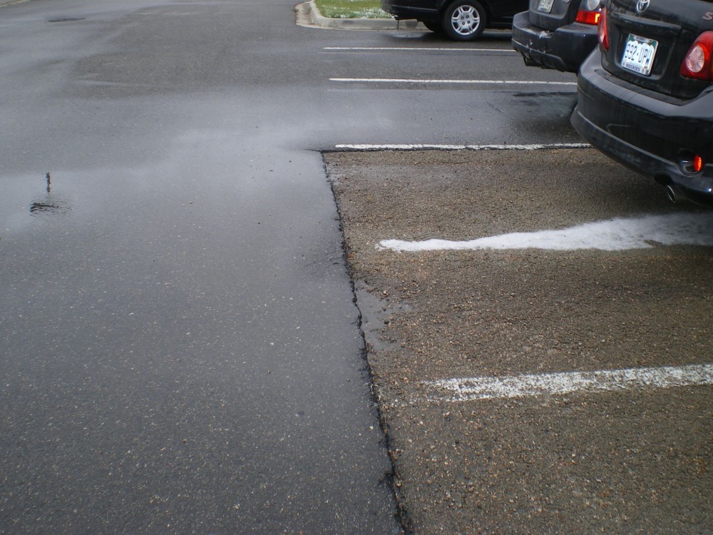 A test site in a parking lot comparing pervious concrete to traditional asphalt.