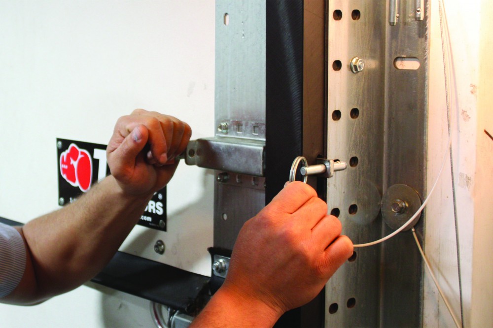 As storms or high-wind events approach, warehouse employees can quickly and easily slide the slide locks and pins into place for added protection.