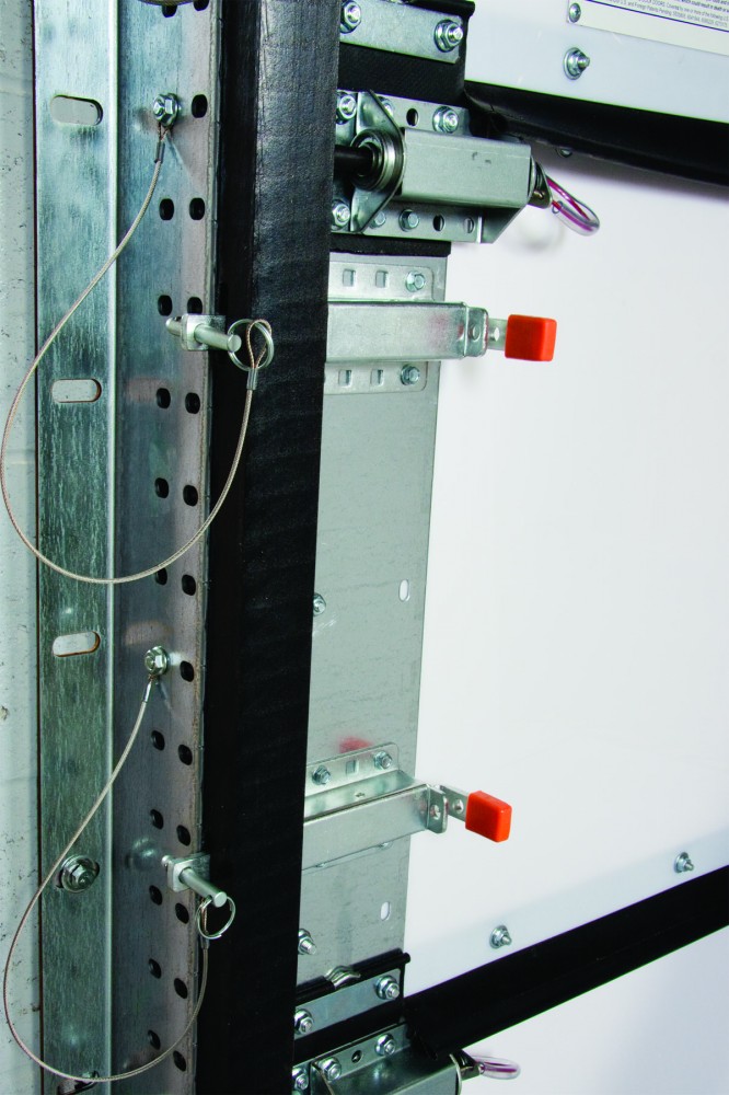 This photo provides details of the slide locks and pins that offer enhanced security during high-wind events.