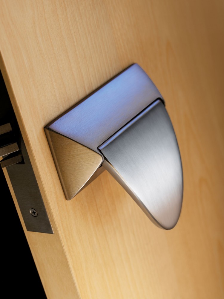 The paddle shape of push/pull trim creates a target for door activation.