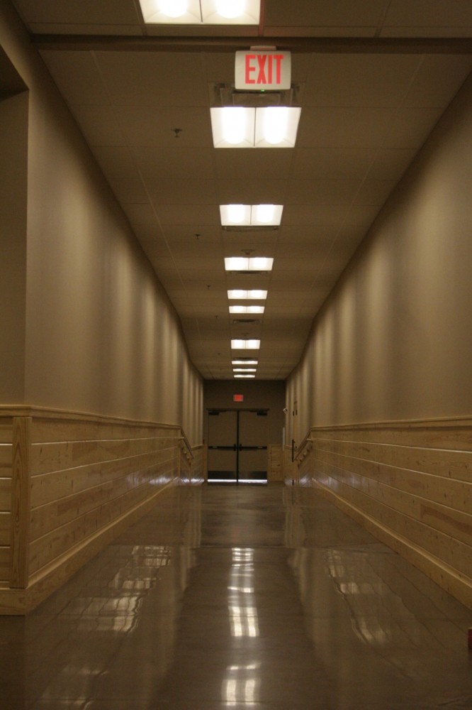 A polished concrete hallway for Sky Ranch in Van, Texas, was completed with finish falling within the ranges specified for the Level 3 finished gloss. [CREDIT] Photo courtesy USA Floor Tec Inc. 