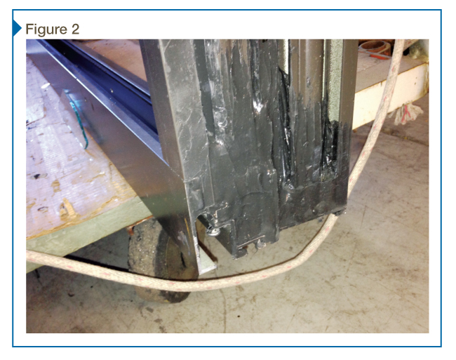 Sealed aluminum window frame corner.