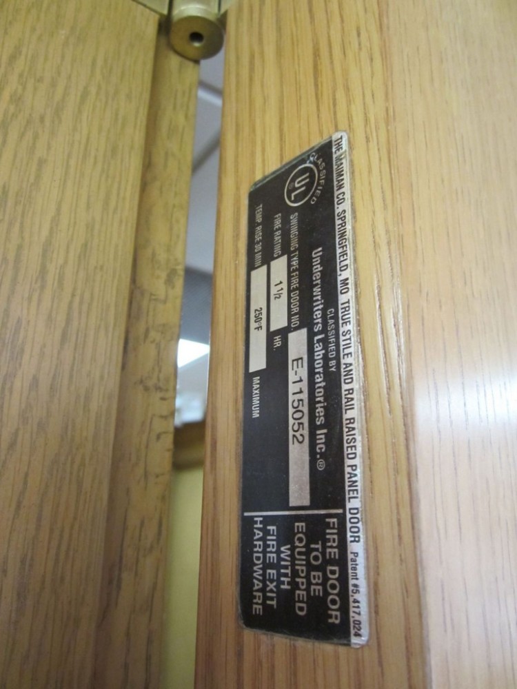 Fire doors equipped with fire exit hardware will have a label stating this, which indicates the door is properly constructed and reinforced for fire exit hardware.
