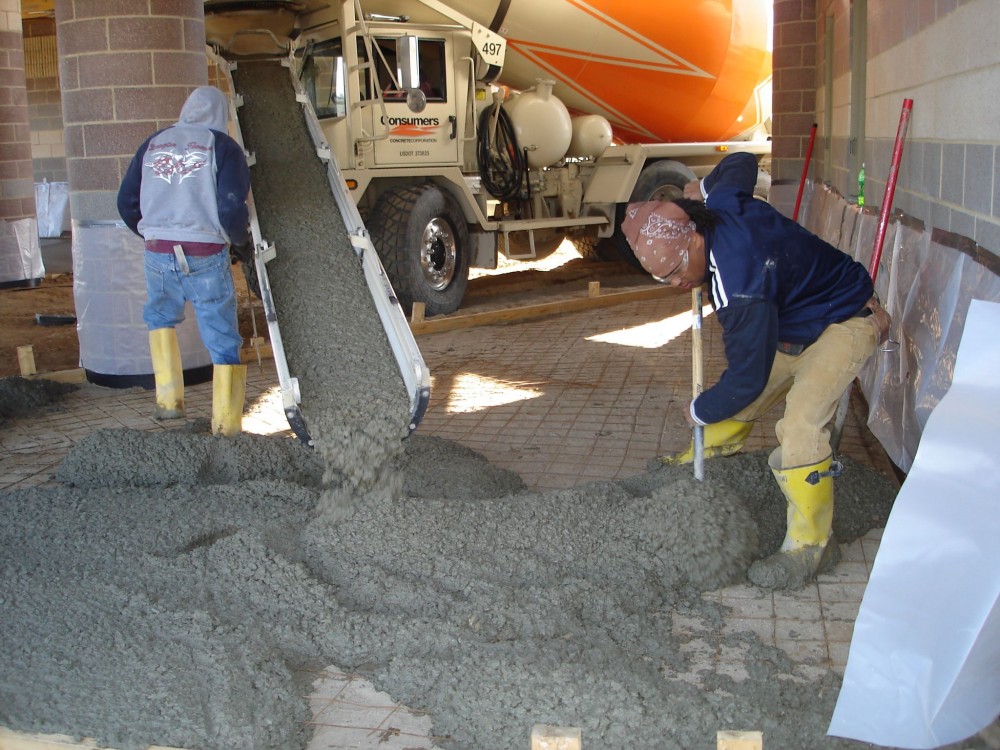 Concrete with a water to cement (w/c) ratio of 0.45 and below is stiff when it comes off the truck—otherwise, it may have been tampered with.