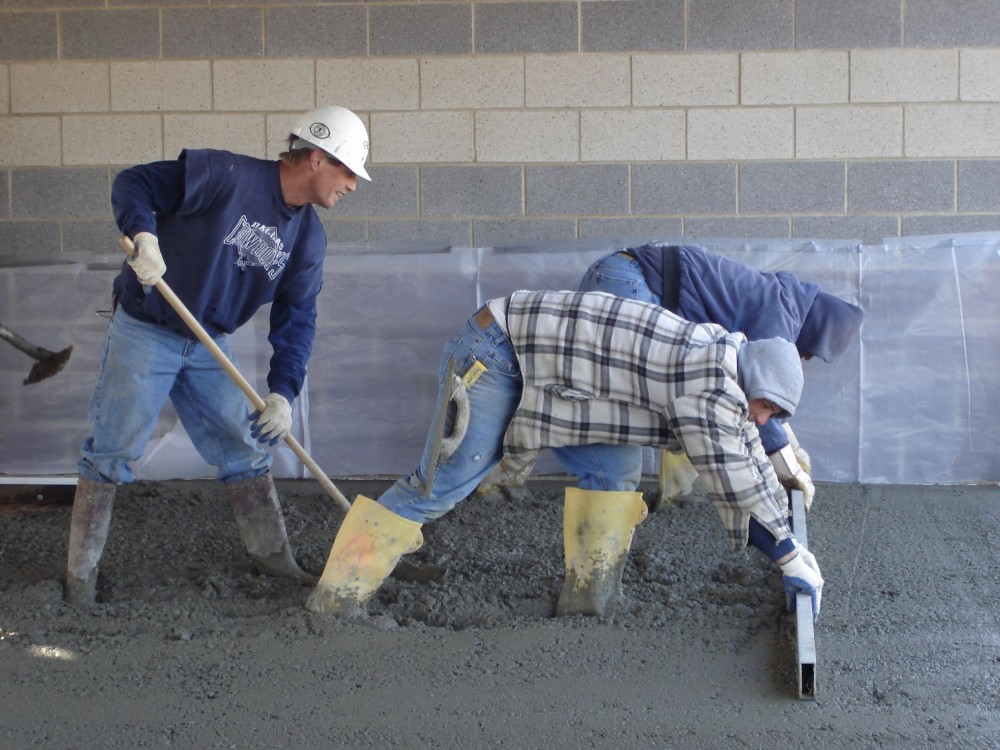 While finishing is not any more difficult with low w/c concrete, placement, and screeding require an ambitious crew.