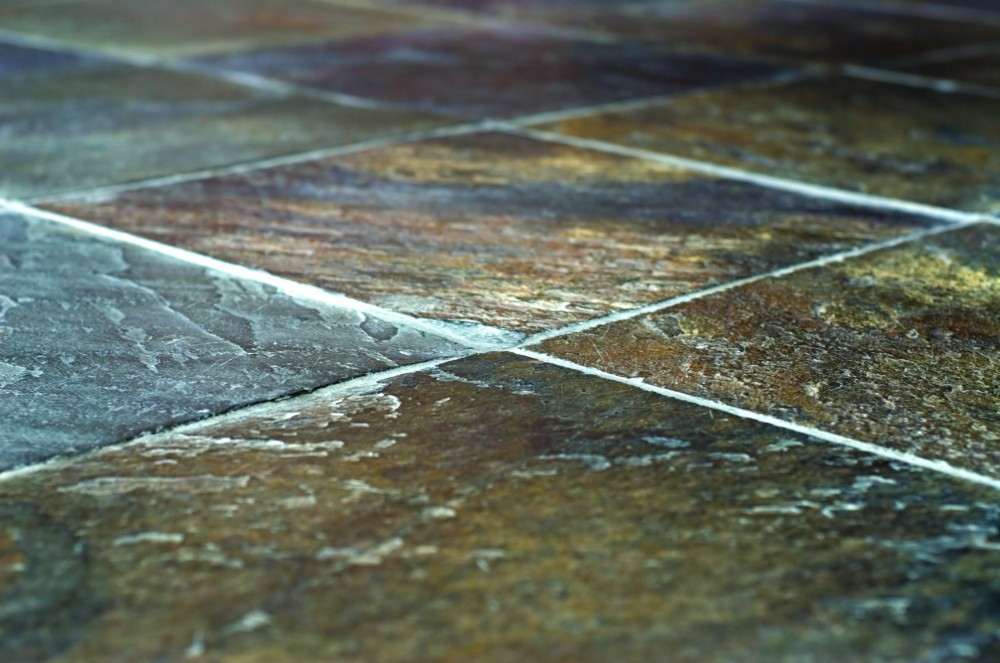 Since effl orescence occurs when watersoluble minerals dissolve and migrate to the installation surface, interrupting this process with waterproof membranes and setting materials with low absorption rates can help prevent it. Photo courtesy TEC/H.B. Fuller Construction Products