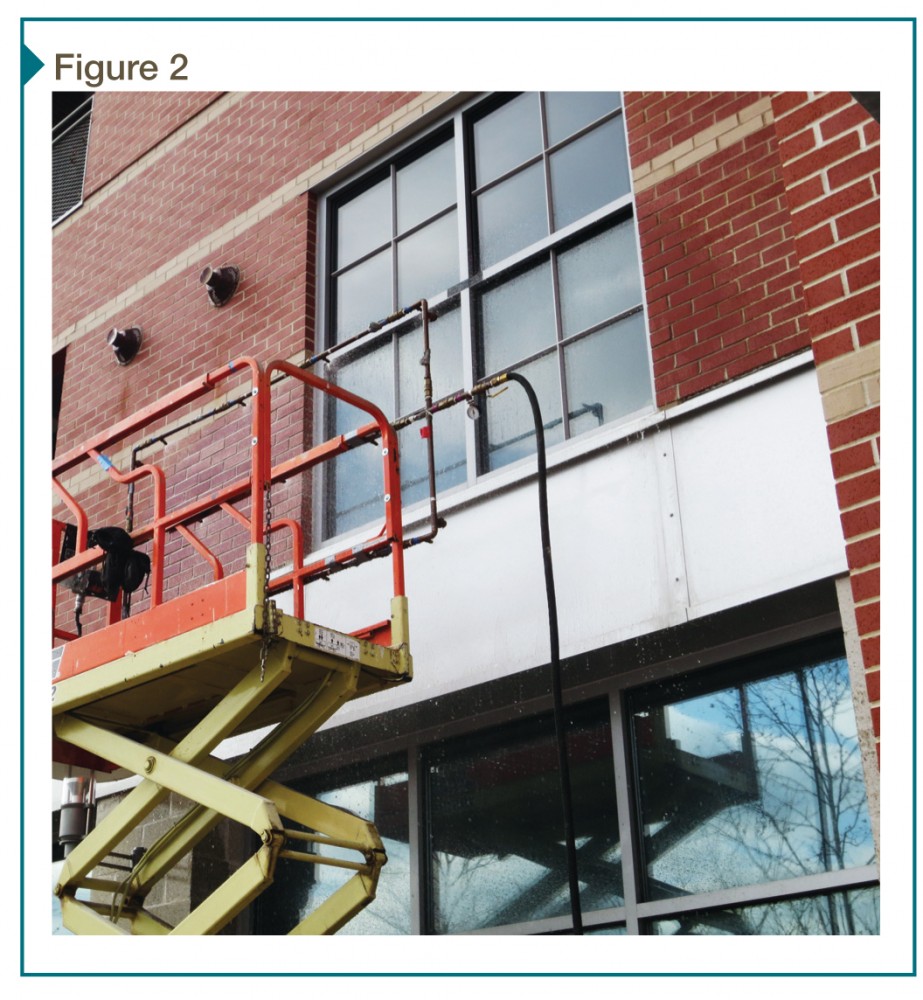 The spray rack above has been positioned on the window exterior for AAMA 502, Voluntary Specification for Field Testing of Newly Installed Fenestration Products.
