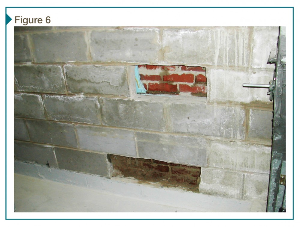 Water leakage through brick veneer/cavity wall can be seen from the interior through openings in the backup wall. The veneer does not provide actual waterproofing for this assembly due to presence of drainage plane and weather-resistant barriers.