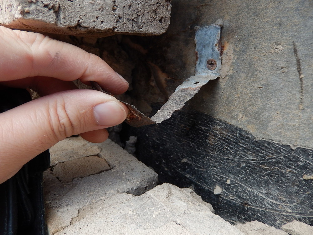 corrugated sheet-metal anchors—commonly referred to as ‘brick ties’—are routinely installed improperly due to the gap between project specifications and building code requirements. Supplementary specifications for brick ties are necessary to provide a code-compliant and durable masonry veneer. All images courtesy Building Diagnostics, Inc.
