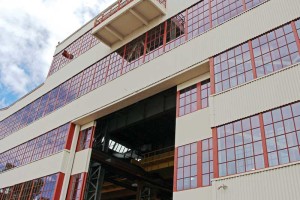 Building 155 at the Pearl Harbor Naval Shipyard has been restored with new glazing and hot-rolled steel framing. Photo courtesy Danielle Jones, Pearl Harbor Naval Shipyard/Intermediate Maintenance Facility