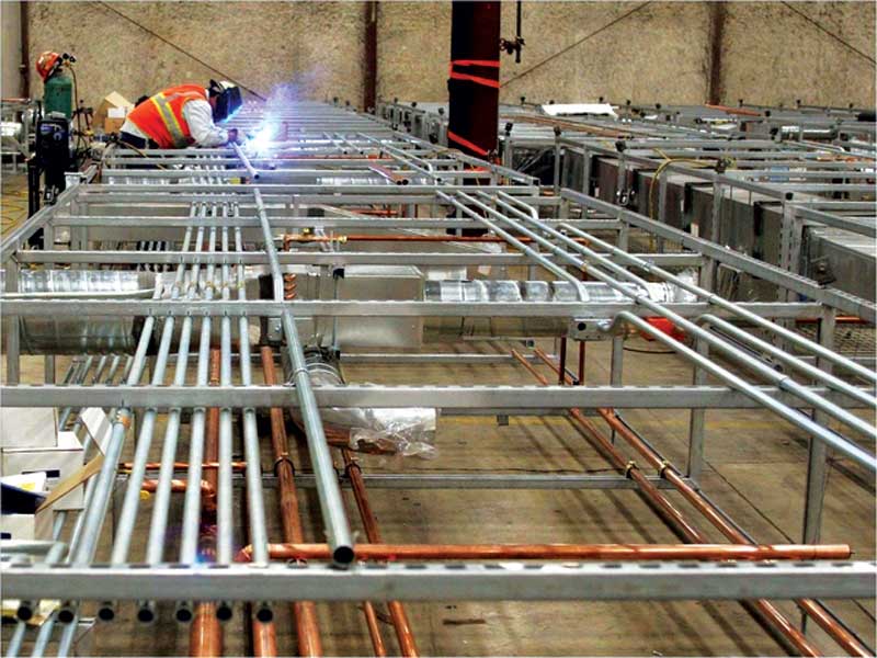 BIM coordination can assist greatly with many of the design-build mechanical/electrical/plumbing (MEP) prefabrication aspects of restroom design. Photo courtesy Skanska USA Building