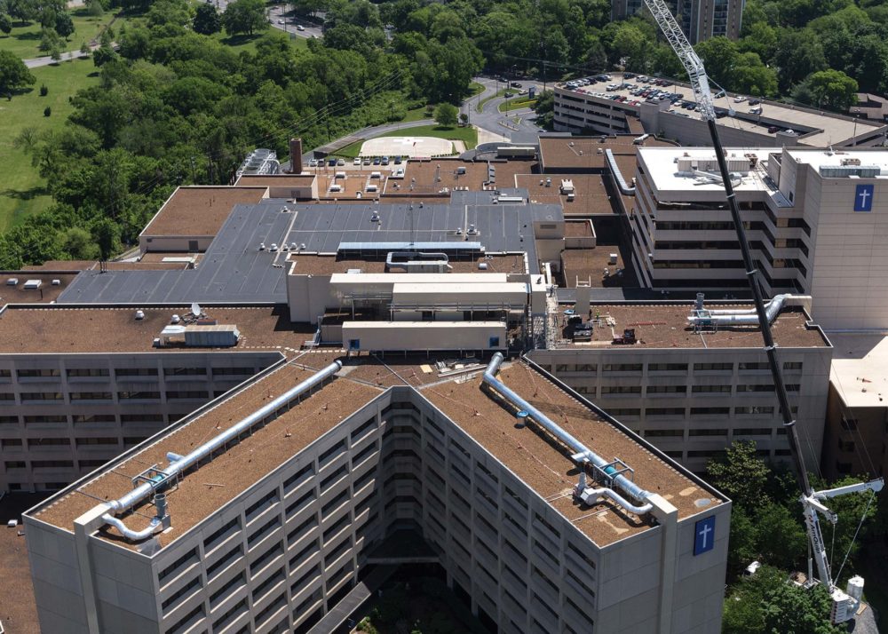 The three large beige boxes in the middle of the ‘K’-shape building’s roof are plenums that also aesthetically cover the newly installed energy-recovery ventilation (ERV) units from street view. Photos courtesy SEMCO