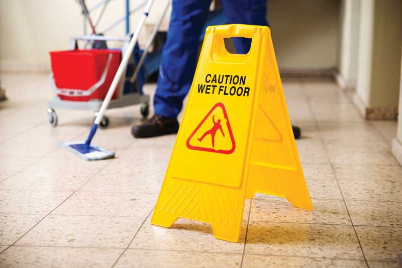 bigstock-Worker-Mopping-Floor-With-Wet--102667850