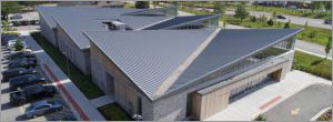 Angled metal roof panels create a vision of wings for Illinois rehab facility
