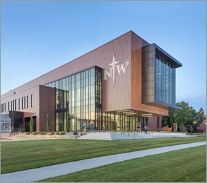 Iowa science center uses coated metal to match the look of brick
