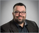 Tom Schultz promoted to associate at TAT