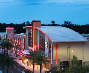 Curved metal roof welcomes moviegoers at Florida theater