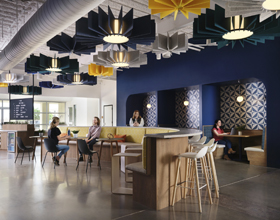 Office design blends rustic Texas and techie elements for an employee-focused transformation