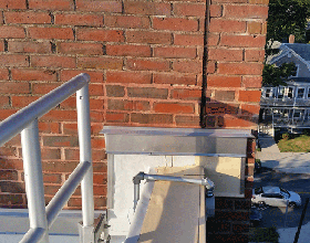 Choosing between restoring or replacing cracked, spalled, and displaced brick facades