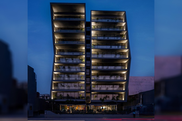 Why this office block leans forward and backward