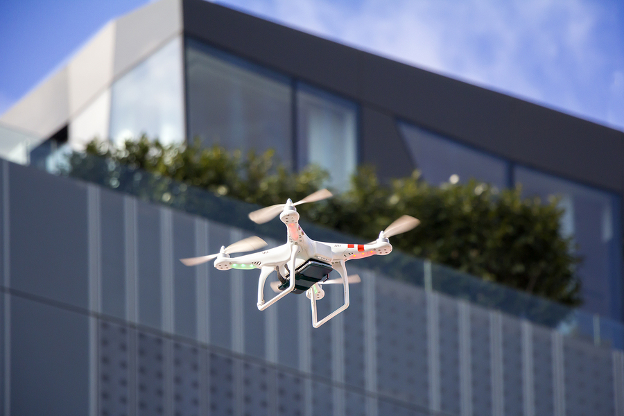 Drone inspecting a building façade