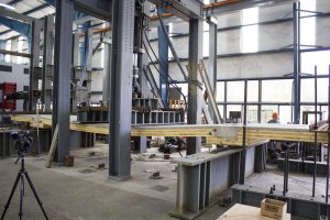 Full-scale testing of composite timber floor system at Oregon State University. Test at 800 percent service loads.
