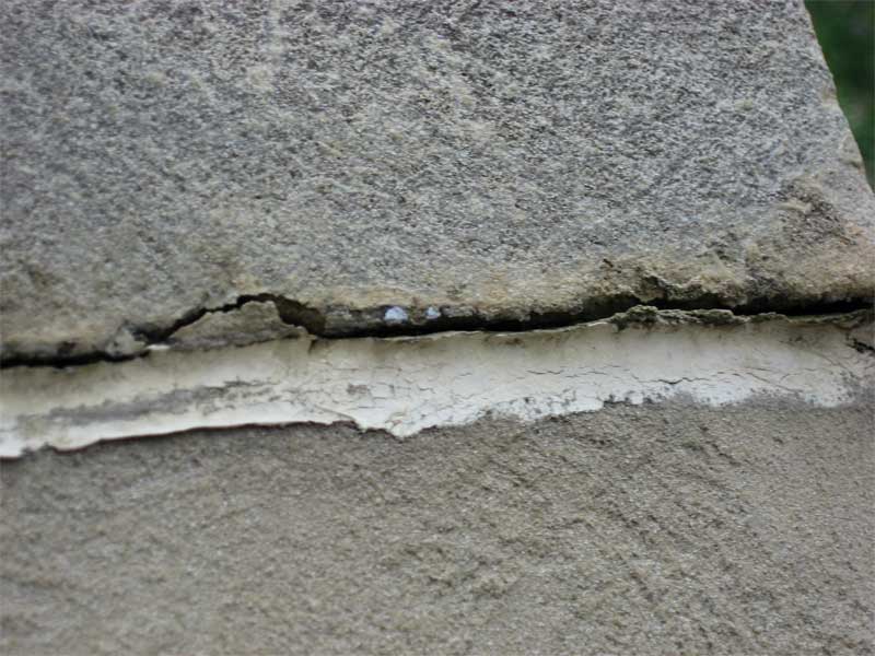 An example of adhesive failure where the sealant pulls away from the substrate.