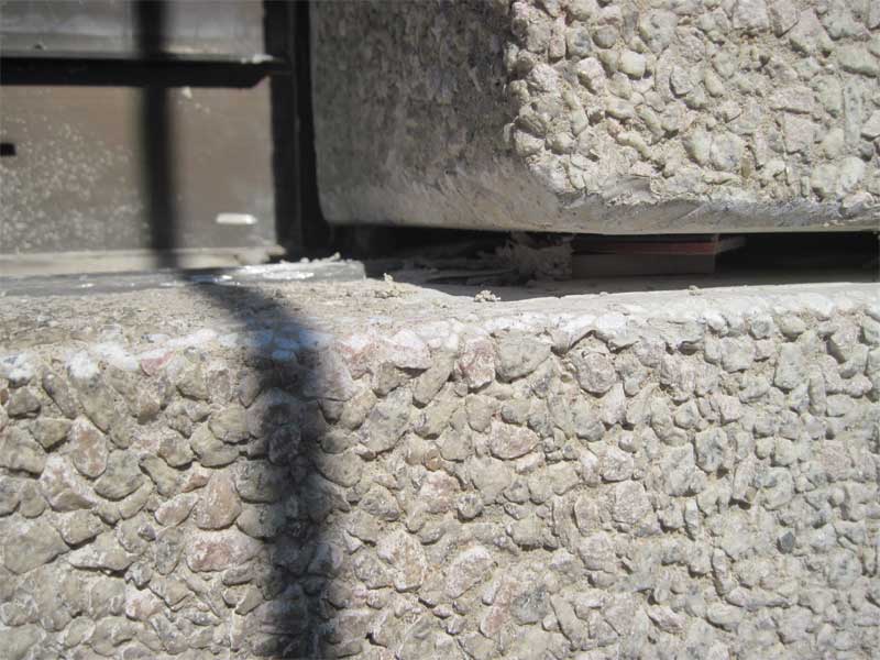 Insufficient joint preparation can compromise sealant adhesion. Debris and residue must be cleaned prior to new sealant installation.