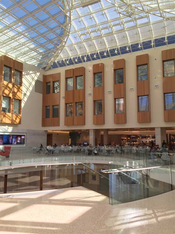 Micro-perforated wood panels around the windows provide critical sound absorption for the atrium at the Olin School of Business located on the campus of Washington University in St. Louis, Missouri. Photo courtesy Acentech/Moore Ruble Yudell Architects & Planners