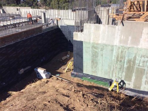 Figure 2: An often forgotten detail is the tie-in from below-grade waterproofing to under slab/footing vapor barrier.