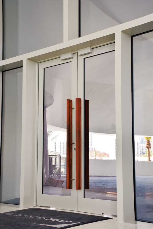 First-level pool and beachfront doors at Jade Signature Condominiums.