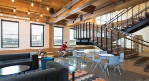 In Ankrom Moisan’s headquarters, the only interruptions of the open office floorplan are intentional, separated spaces where designers collaborate, hold meetings, or take phone calls. Photos courtesy Casey Braunger