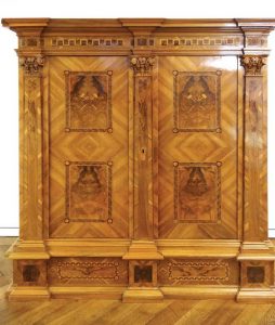 Figure 1: Wood veneer and marquetry casework built circa 1780.