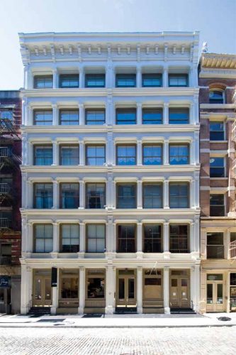 Like many
other cast-iron restoration projects, the scope of the
77 Mercer Street project involved much more than just a fresh coat of paint. The project included rehabilitation of the cast-iron structure, design of a decorative metal cornice, sidewalk restoration, and waterproofing to correct moisture infiltration issues.