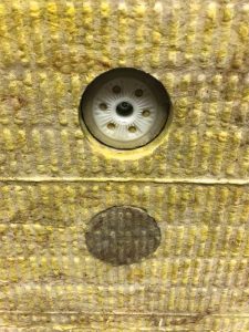 When deployed as the insulation layer in exterior ci systems, mineral wool is attached with dowel fasteners. To minimize thermal bridging, the fasteners can be countersunk and caps inserted on top of the dowel.
