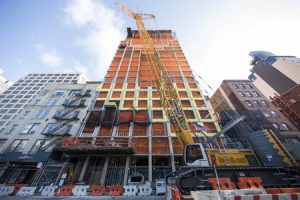 With classic New York design and a French aesthetic, the Greenwich Tower in West Soho weaves into the urban fabric of the historic streetscape. Photo courtesy Greenwich West