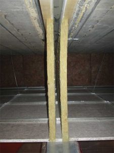 Figure 4: If the walls are not full height from slab to slab, then a vertical plenum barrier over the wall can be used in combination with the ceiling to achieve the desired level of acoustic performance.