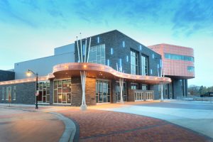 The Pablo Center at the Confluence in Wisconsin used stone, copper, and insualted metal panel to fit into its surrounding structures. Photo courtesy Metl-Span