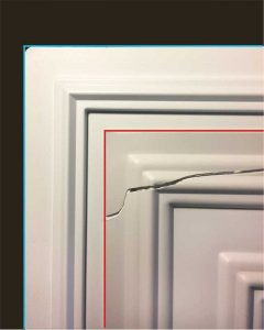 Figure 3: There is a wide range of performance within each product category. The thermoformed panel on top (outlined in red) is cracked. It has a high percentage of filler that makes it brittle and subject to breakage if dropped or flexed during handling. In contrast, the lower thermoformed panel (blue) contains no filler and is supple enough to withstand repeated handling without breaking.
