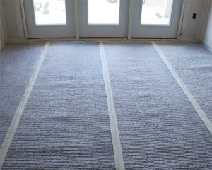 Properly installed sound mat covered with a layer of gypsum underlayment provides long-term benefits for property owners and residents.