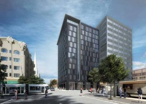 The 6618-m2 (71,232-sf) Moxy Portland hotel in Oregon has an open base featuring large, operable glass walls. Image courtesy DLR Group