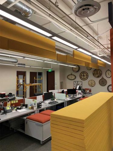 Linear ceiling blades and sculpted panels can be used to enhance the aesthetics and acoustic performance of a space.